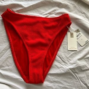 Good American mid-rise bikini bottom in Bright Poppy. Never worn, new with tags